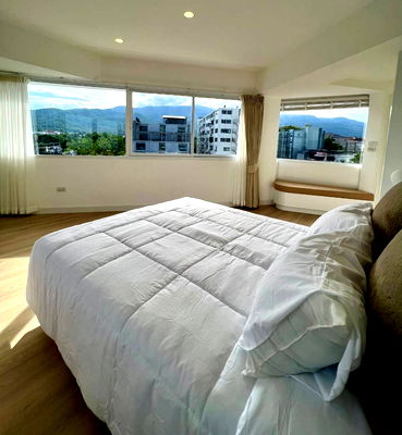 Condos for sale 700 Year Sports Arena Chiang Mai : For sale "Ruean Kham Tower Condo" 2 bedroom condo in the middle of Nimman, Doi Suthep view, Highlights: 180-degree room view T.094-651-1456
