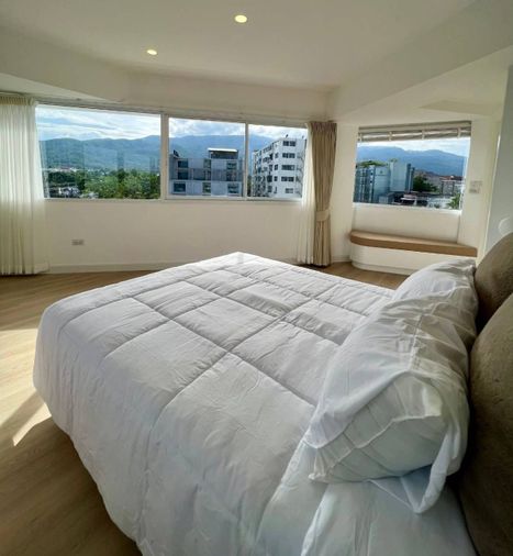 For sale "Ruean Kham Tower Condo" 2 bedroom condo in the middle of Nimman, Doi Suthep view, Highlights: 180-degree room view T.094-651-1456