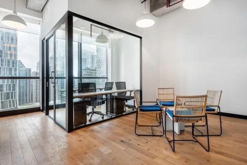 Fully furnished office space for rent  featuring modern-style decor and fully equipped with essential office furniture for immediate use.