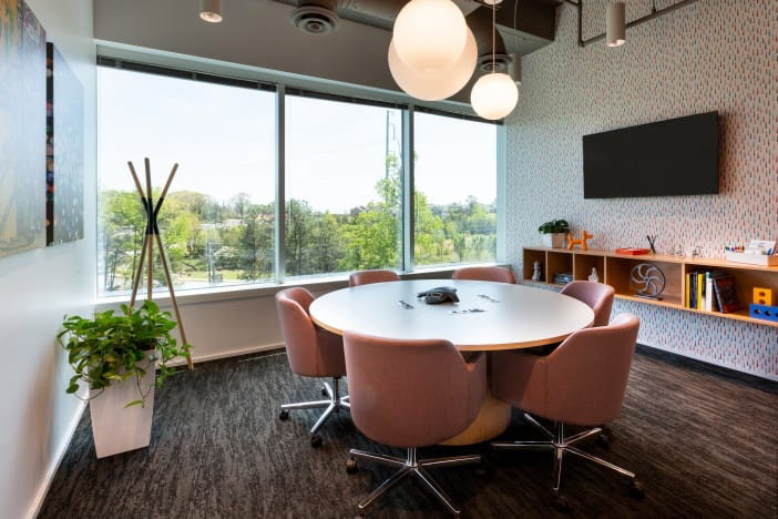 Fully furnished office space for rent featuring modern-style decor and fully equipped with essential office furniture for immediate use.
