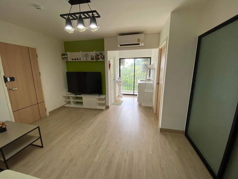 The condo is located near Si Saman Expressway, offering convenient access to the city.