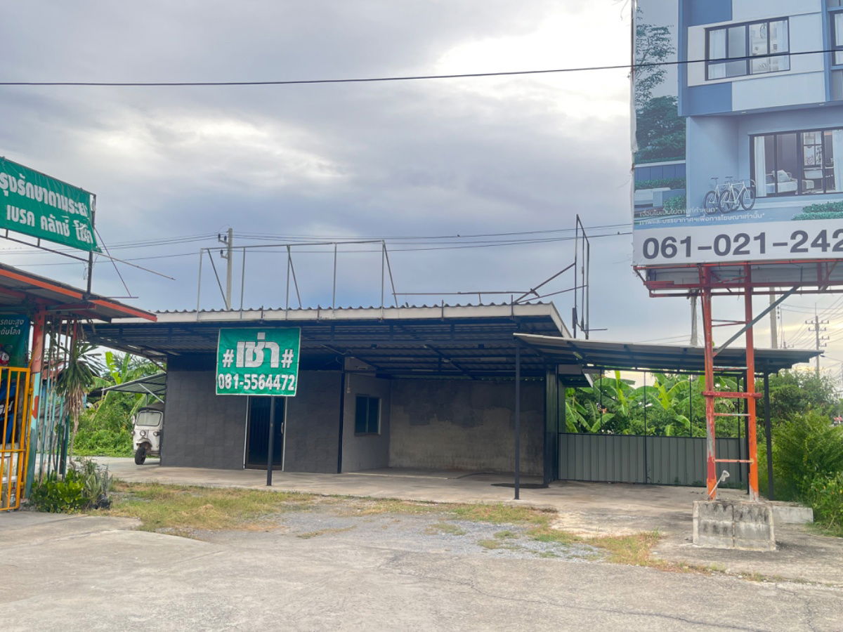 picture For rent: land with a building for business. Prime location on the main road 346, directly opposite the entrance to the Pathum Thani Transport Office. - 1/7
