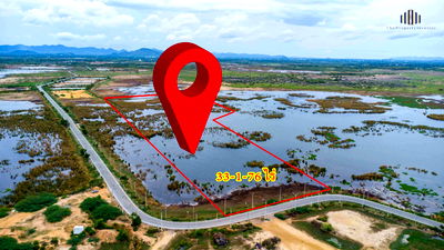 Land for sale Prachaubkirikhan : Great investment land! 33-1-76 rai plot, located on Highway 1021, with a 75-meter frontage and two public roads. High-potential location. 