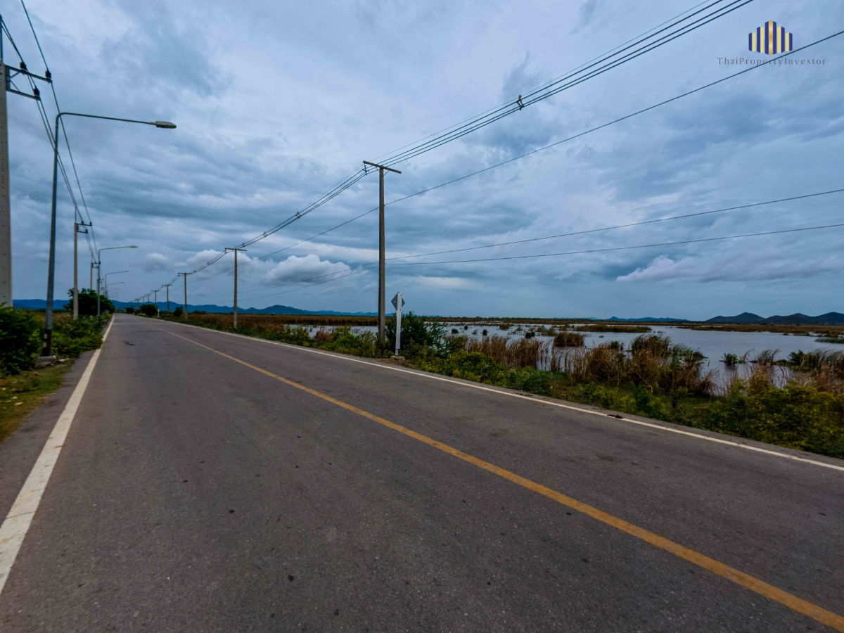 picture Great investment land! 33-1-76 rai plot, located on Highway 1021, with a 75-meter frontage and two public roads. High-potential location.  - 5/12