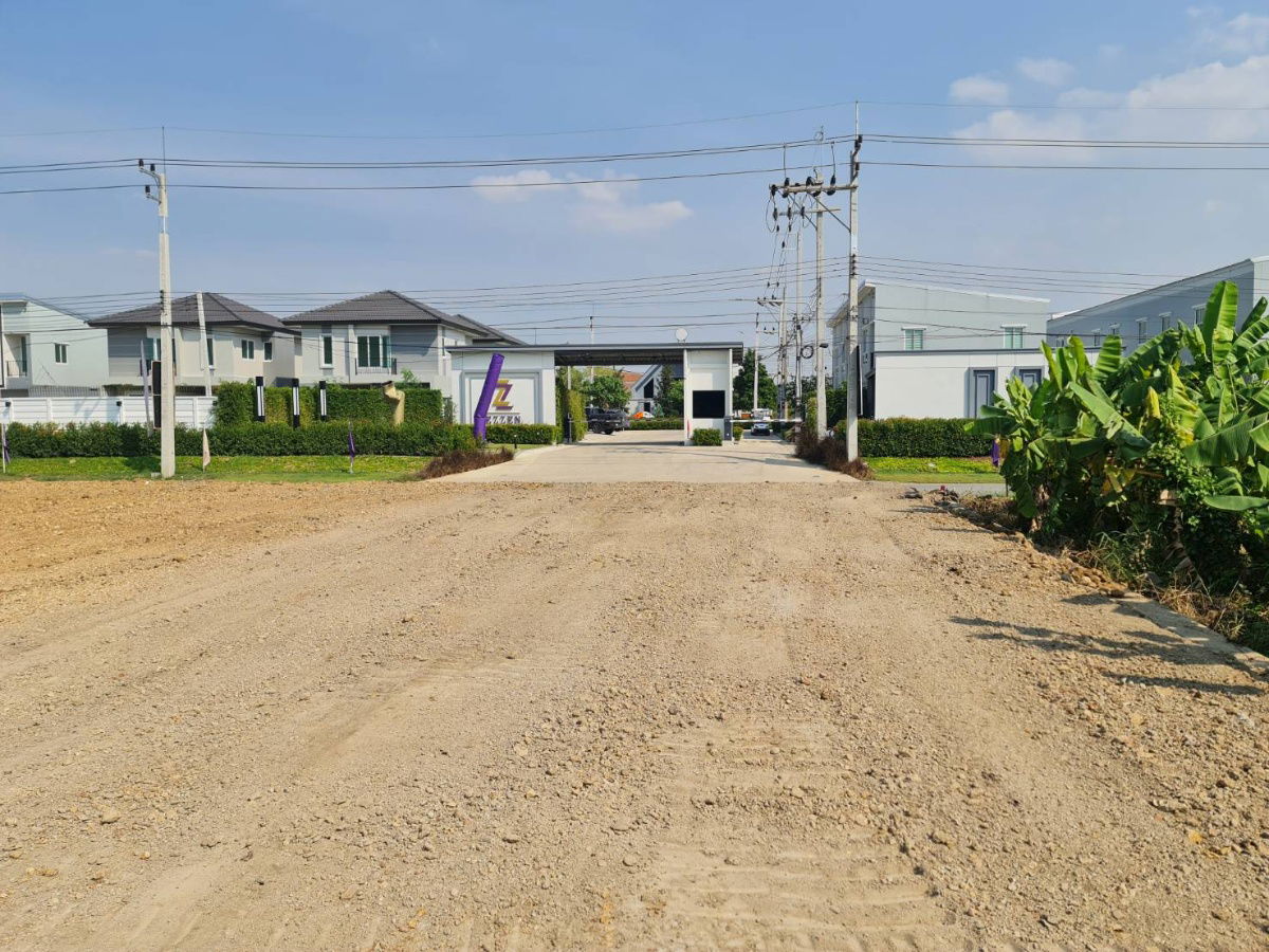 picture Land for sale in front of the entrance to EZZEN Salaya - 10/24