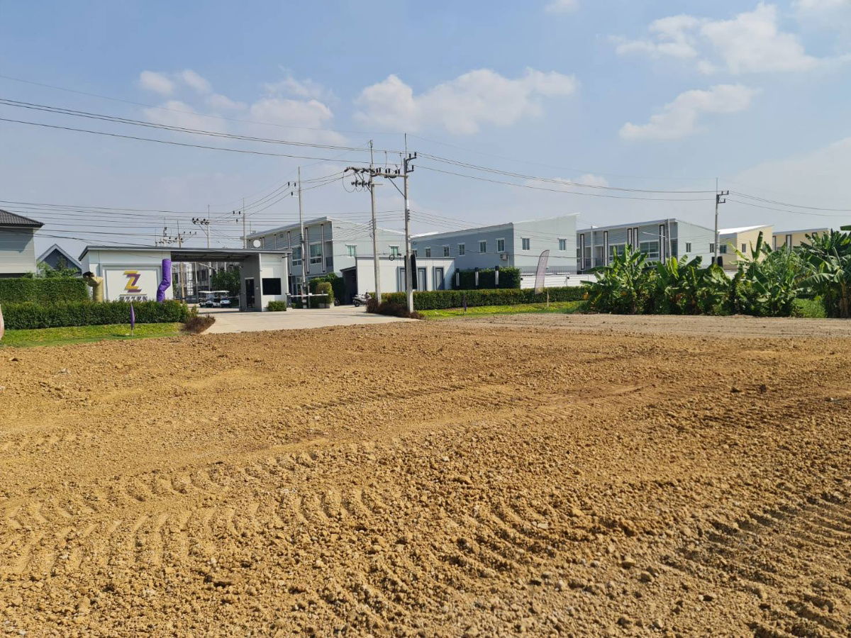 picture Land for sale in front of the entrance to EZZEN Salaya - 13/24