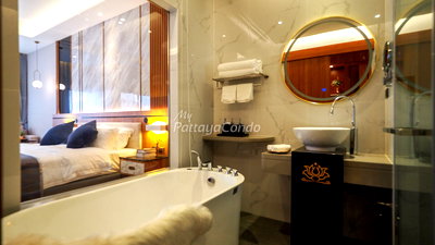 ขายคอนโด : 🛏️ 2 ห้องนอน - 🛁 2 ห้องน้ำ - 🏙️ Pool View - 🇹🇭 ชื่อไทย - 🏢 Wyndham Jomtien Pattaya - รหัส: WYNDJ03