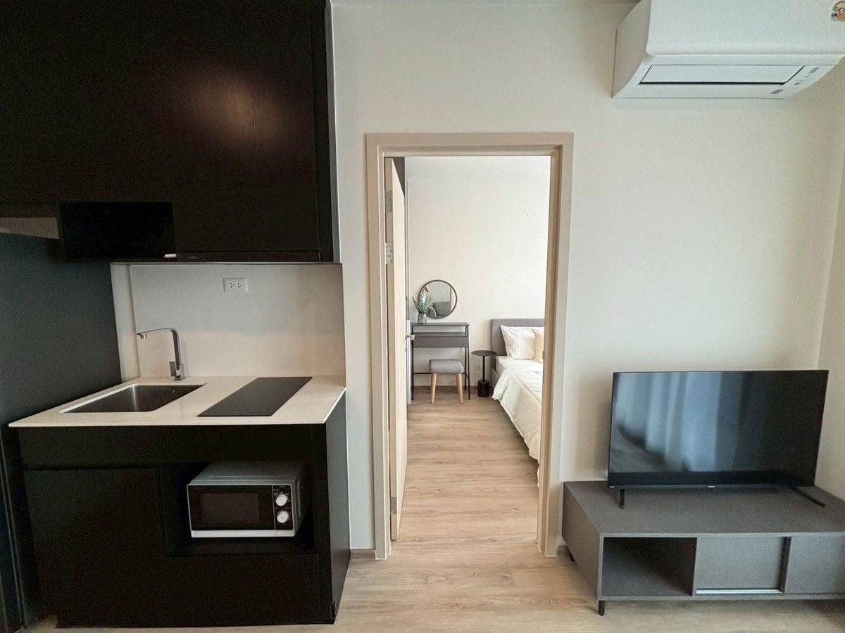 picture For Rent Nue District Rama 9, 1 Bedroom 1 Bathroom, 17th floor, 30.2 sqm, fully furnished, 21,000 THB/month, 1 year contract. Ready to move - 3/10