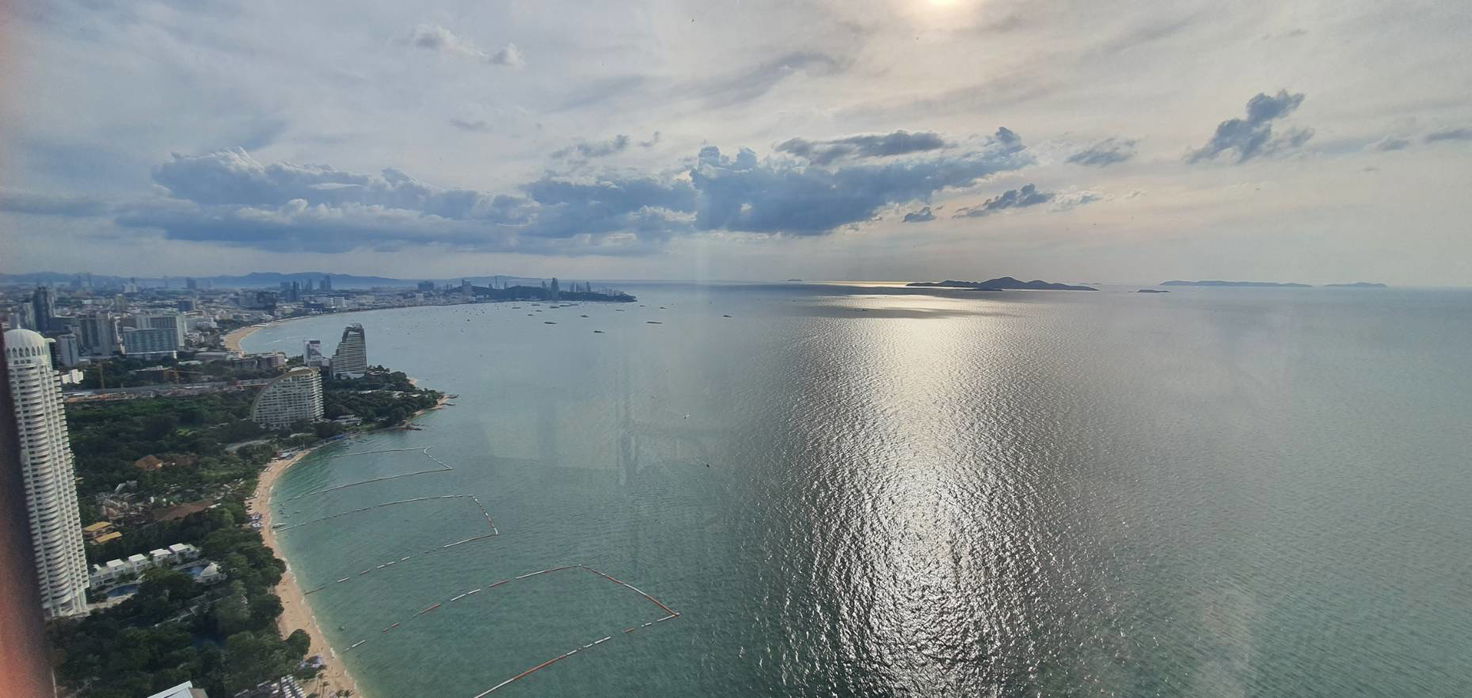 รูป คอนโดวิวทะเลสุดหรูทันสมัย ​​1 ห้องนอน ที่ AROM Wongamat - รูปที่ 4/10