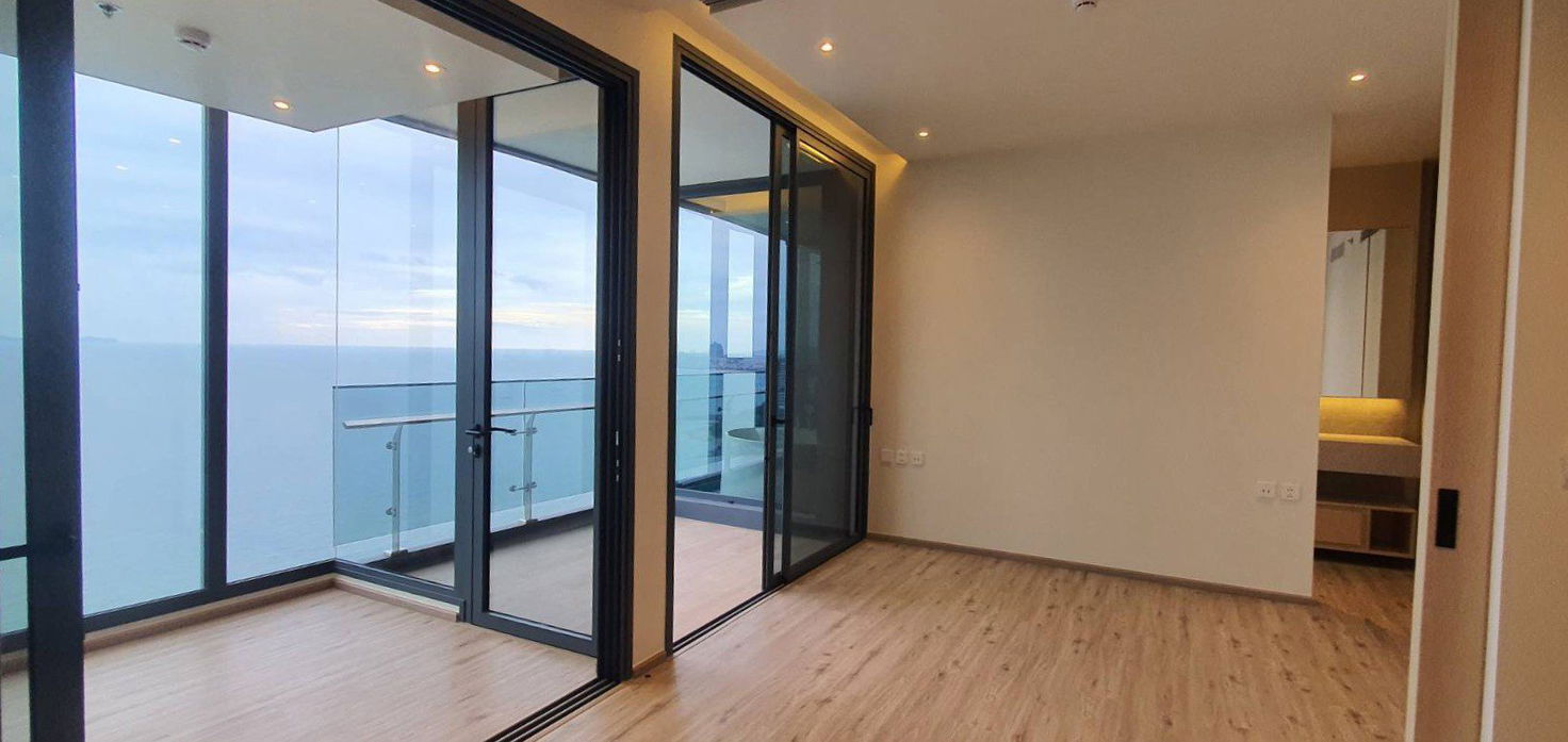 รูป คอนโดวิวทะเลสุดหรูทันสมัย ​​1 ห้องนอน ที่ AROM Wongamat - รูปที่ 2/10