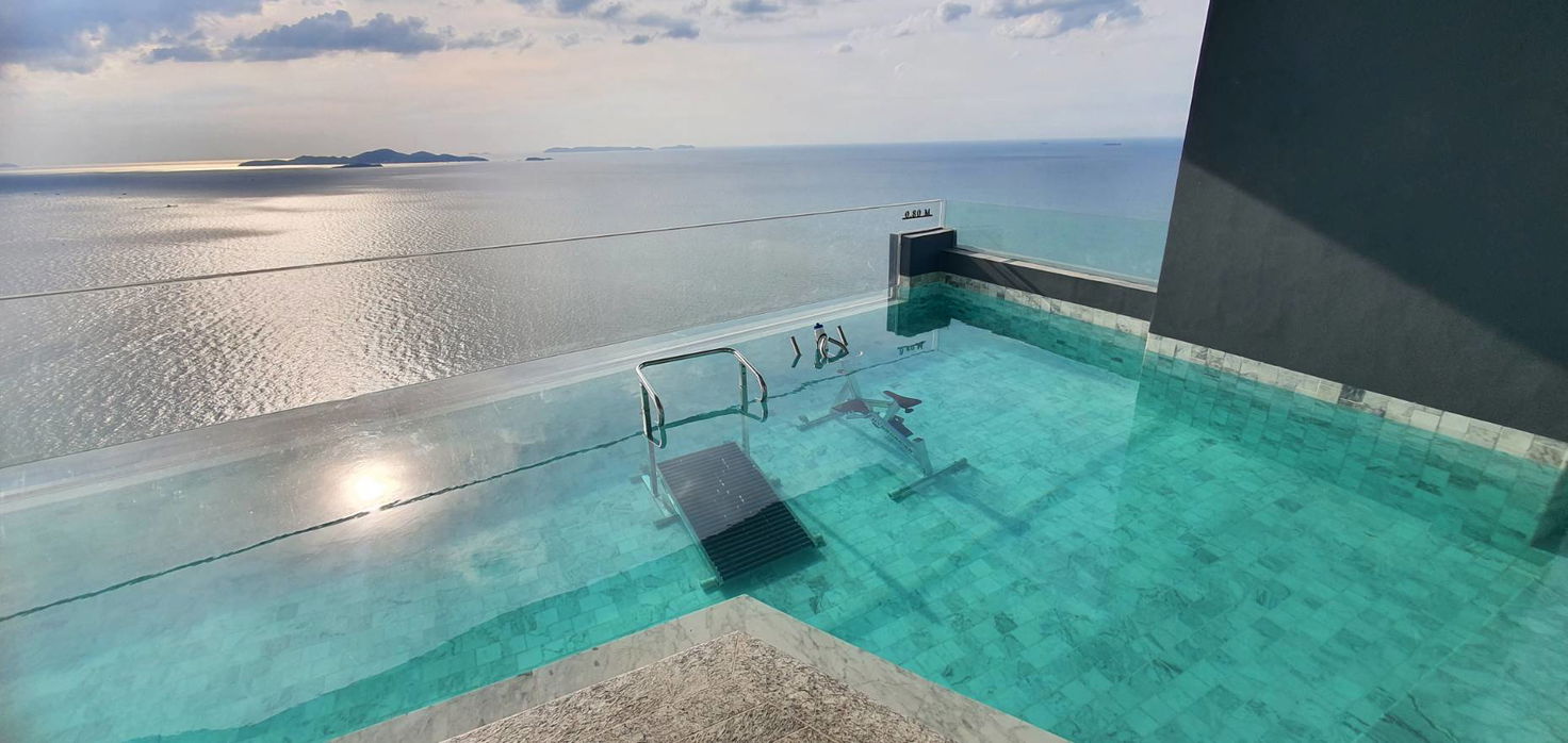 รูป คอนโดวิวทะเลสุดหรูทันสมัย ​​1 ห้องนอน ที่ AROM Wongamat - รูปที่ 7/10