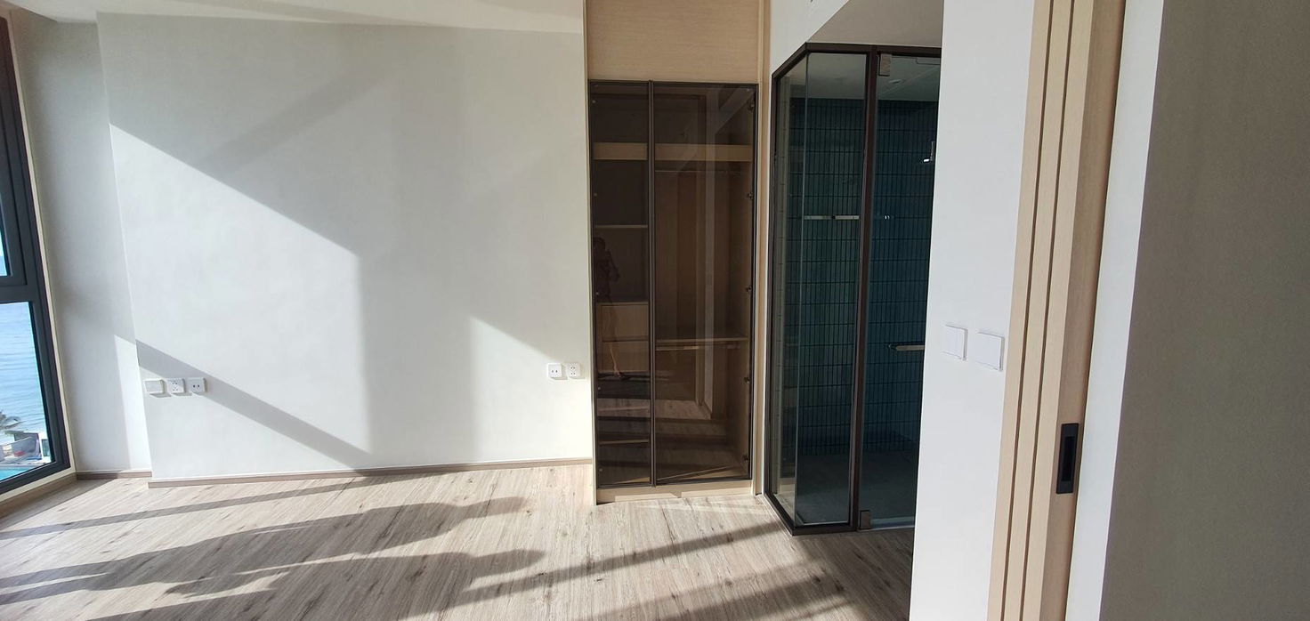 รูป คอนโดวิวทะเลสุดหรูทันสมัย ​​1 ห้องนอน ที่ AROM Wongamat - รูปที่ 2/10