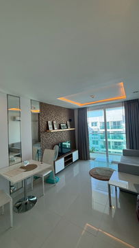 Condo 1 bedroom, 1 bathroom, pool view, with furniture and electrical appliances.