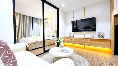 Condos for sale 700 Year Sports Arena Chiang Mai : Fully Renovated Corner Condo in Prime Jed Yod, Chiang Mai High floor, open view, excellent location near CMU and Nimman