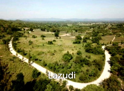 Land for sale : Beautiful elevated land of 15 Rai with great views near Banyan Golf Club.