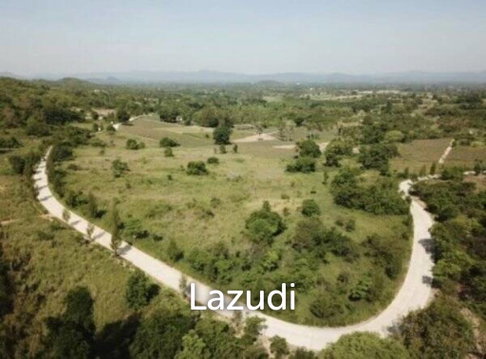 Beautiful elevated land of 15 Rai with great views near Banyan Golf Club.