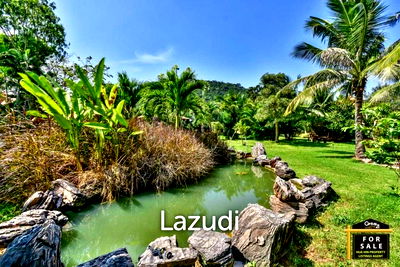 Land for sale Sam Roi Yot Prachaubkirikhan : Exotic Land Plot with Feature Pond