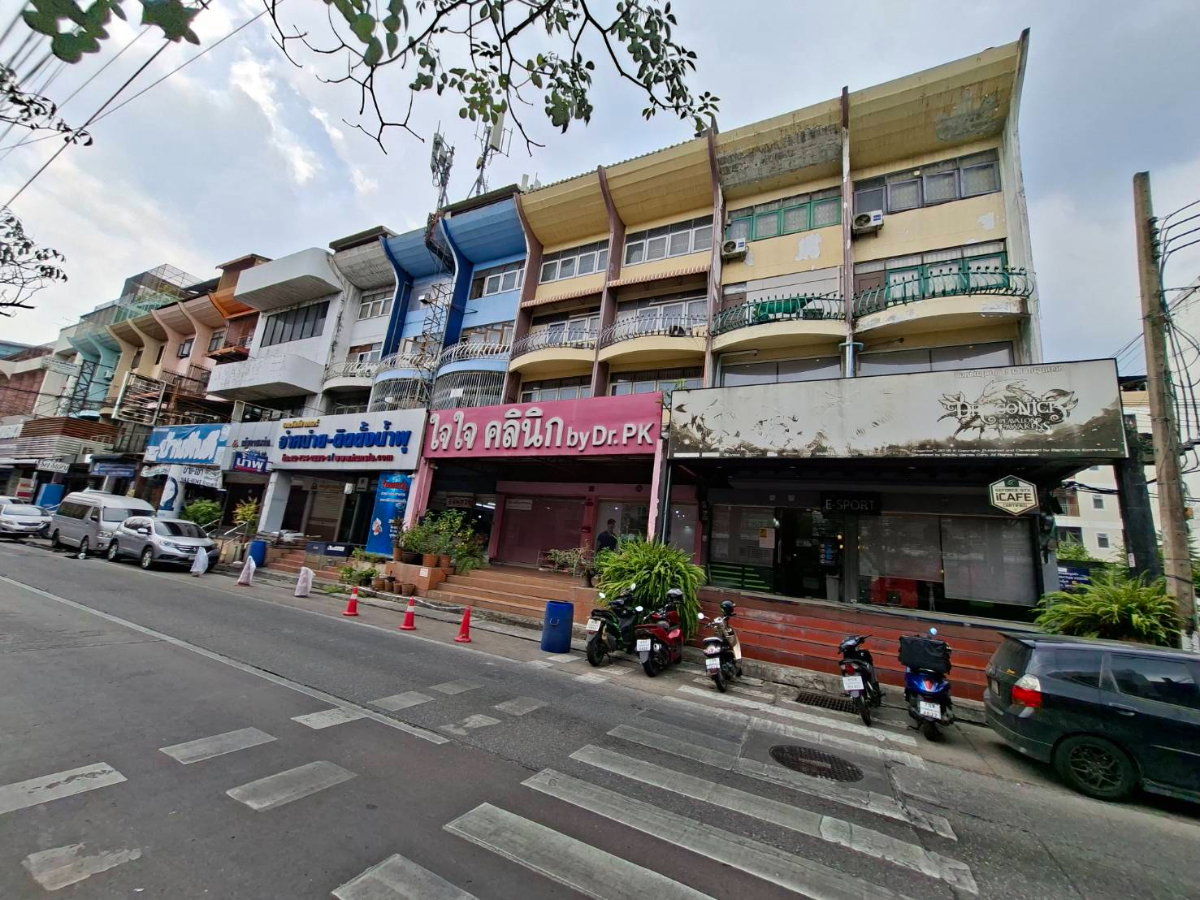 picture Four-story commercial building, Happyland. - 4/57