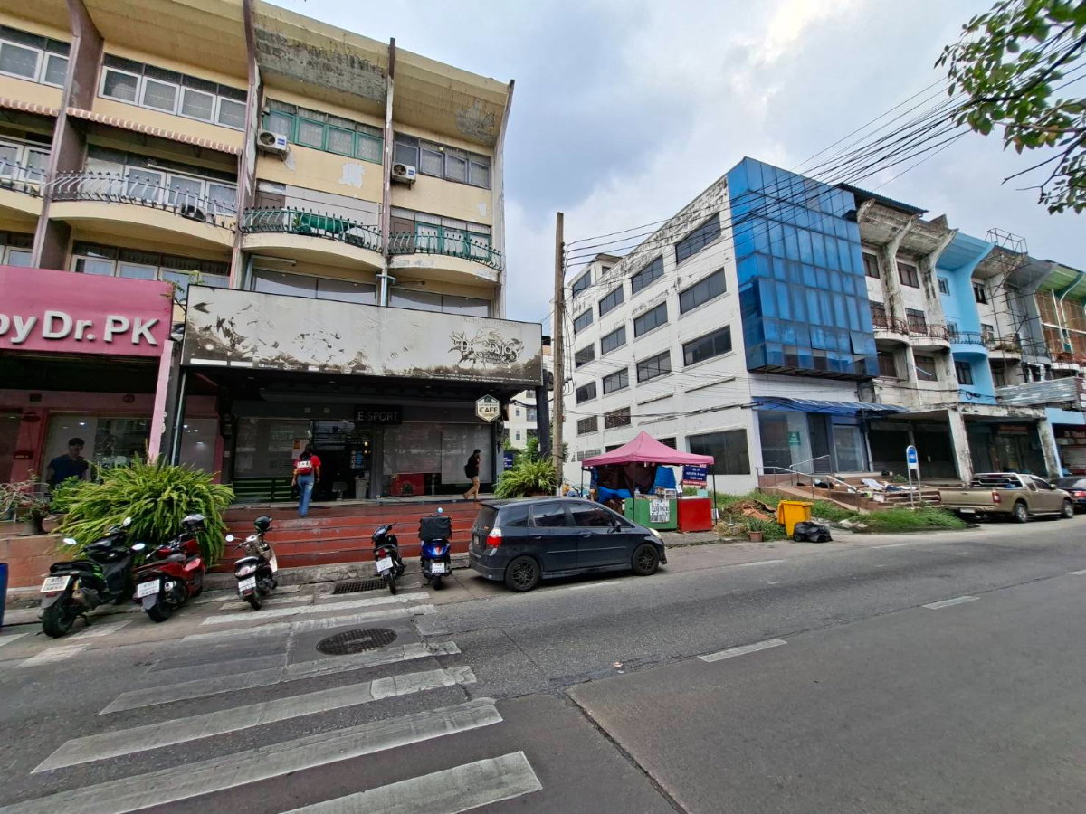 picture Four-story commercial building, Happyland. - 3/57