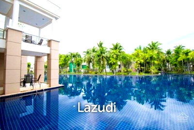 ขายคอนโด : BLUE LAGOON : Immaculately presented 2nd floor 2 bed condo overlooking large swimming pool lagoon.