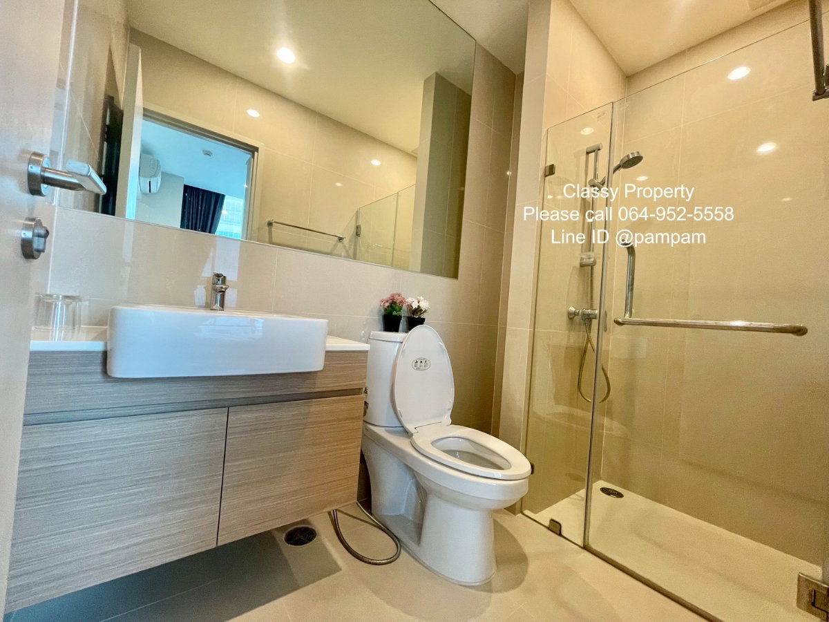 รูป ให้เช่าคอนโด : โนเบิล รีวอล์ฟ รัชดา1 1 ห้องนอน แบบกั้นกระจกใส เฟอร์ครบ ติดMRTศูนย์วัฒนธรรม (Noble Revolve Ratchada1)  - รูปที่ 9/9