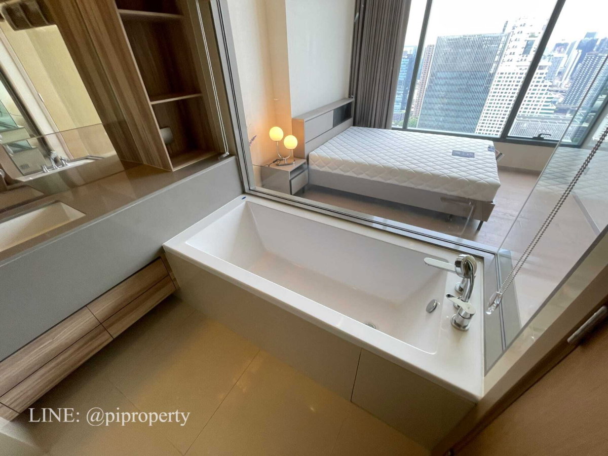 รูป ให้เช่าห้องชุด 1 ห้องนอน ตกแต่งครบครัน ที่ Esse Asoke ชั้นสูง หันหน้าไปทางทิศเหนือ อากาศเย็นสบาย ทำเลดีเยี่ยมในย่านอโศก ใกล้รถไฟฟ้า BTS และ MRT - รูปที่ 11/31