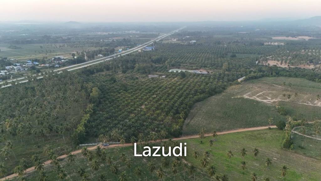 รูป ขายที่ดินลงทุนชั้นดี 60+ ไร่ ติดมอเตอร์เวย์ 7 ห้วยใหญ่ - รูปที่ 1/10