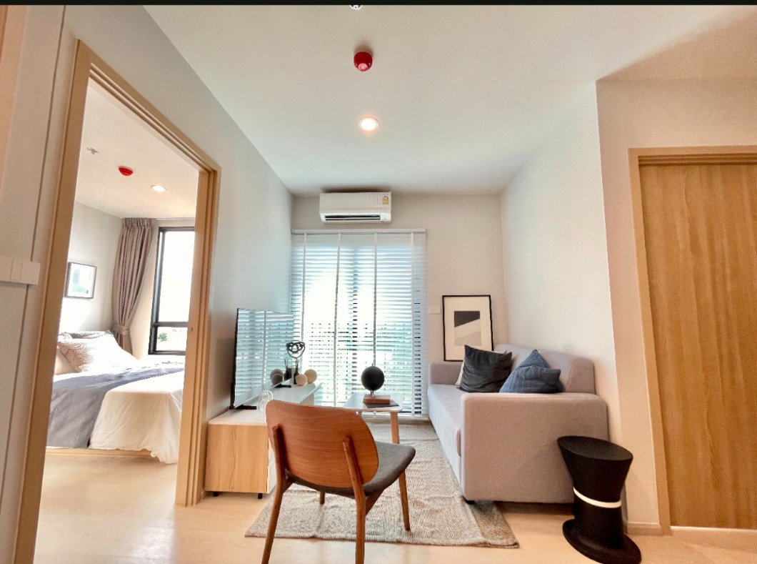 รูป New Connect ดอนเมือง คอนโดใกล้ สนามบินดอนเมือง ภายในห้องมีเฟอร์นิเจอร์ โซฟา โต๊ะ เก้าอี้ เตียง - รูปที่ 7/16