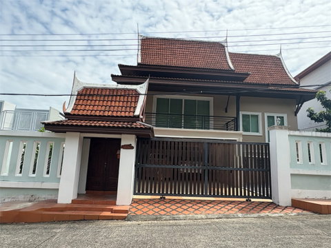 A home designed with love, care, and pride in Thai heritage: Maneekram Village.