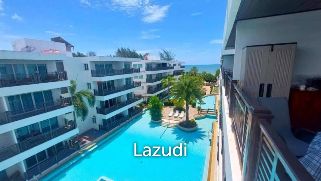 The Beach Palace: FOR SALE, Top Floor with Balcony