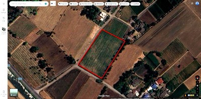 ที่ดิน ท่ามะกา กาญจนบุรี : ที่ดินเปล่า ที่ดินสี่เหลี่ยมผืนผ้า ติดคลองชลประทาน