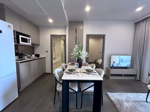 Luxury condo attached to the Khlong Toei MRT management by Dusit Hospitality Services.