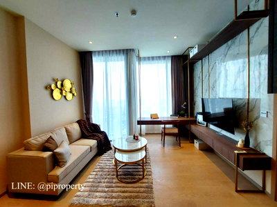 Condos for rent BTS Asok : Experience the perfect blend of warmth and sky-high luxury. 52sqm layout 1Bedroom unit for rent in Esse Asoke. Fully furnished and ready to move in.