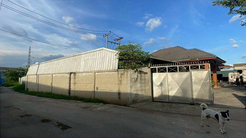 Land with buildings + house + warehouse, including factory license (Form 4).