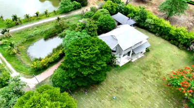 Land for sale Bang Khla Chachoengsao : Riverside Land for Sale on the Bang Pakong River with Private Residence & Private Lake  Bang Khla, Chachoengsao  Land Area: 10 Rai 1 Ngan 67 Sq. Wah