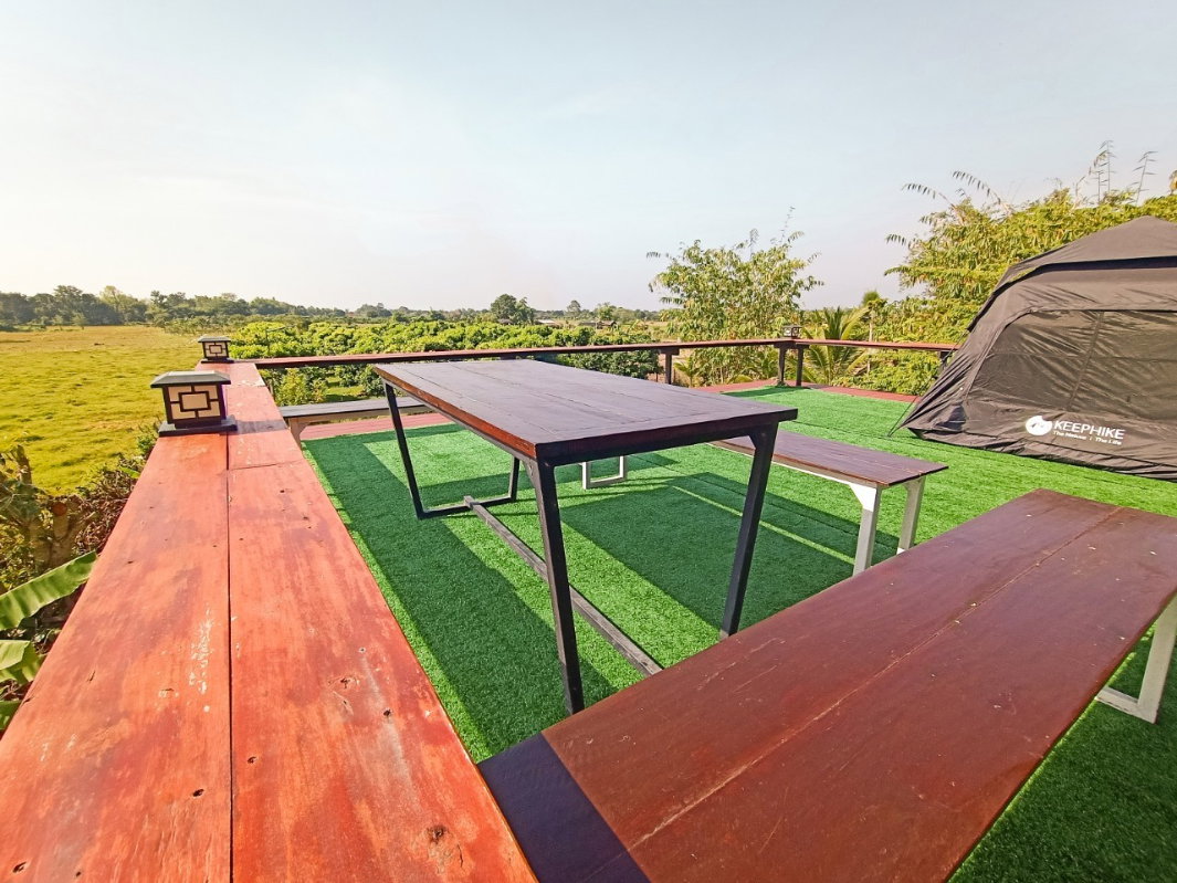 picture A house in a garden, surrounded by rice fields and mountain views, quiet and peaceful. - 48/54