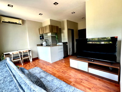 Condos for rent 700 Year Sports Arena Chiang Mai : One Plus Jed Yod 1  Corner unit with pool view — Rent: THB 10,000/month