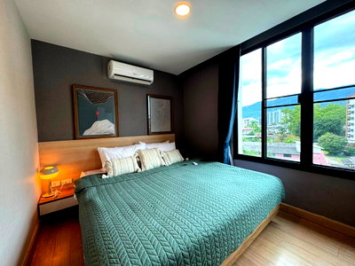 Condos for rent 700 Year Sports Arena Chiang Mai : For Rent: Trams 1 Jed Yod Condo, Doi Suthep view, near Chiang Mai University. Tel. 098-9690236 (Janny)