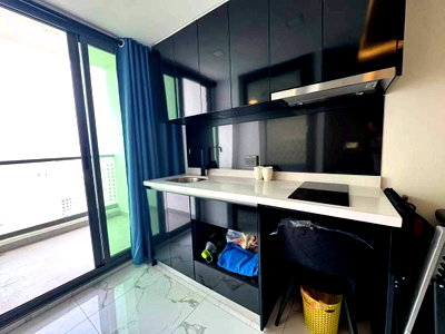Condos for sale Tesco Lotus South Pattaya : Arcadia Milleinium Tower on High Floor with grea sea view for sale below market price ( Foreign Name)