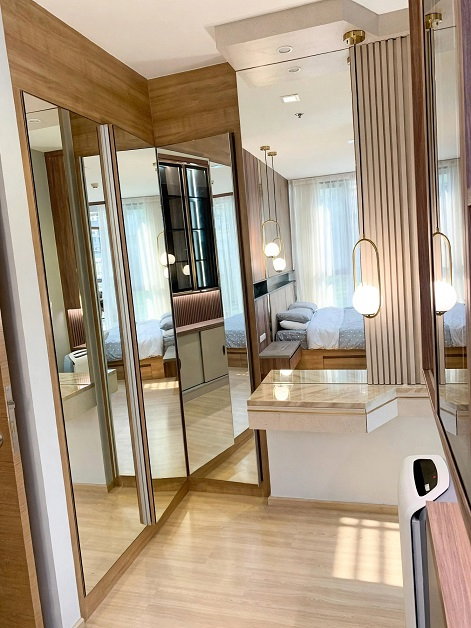 picture This is a **66 sqm, 2-bedroom / 2-bathroom unit at Rhythm Phahol-Ari**, located on the 22nd floor. - 7/7