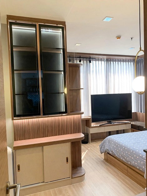 picture This is a **66 sqm, 2-bedroom / 2-bathroom unit at Rhythm Phahol-Ari**, located on the 22nd floor. - 5/7