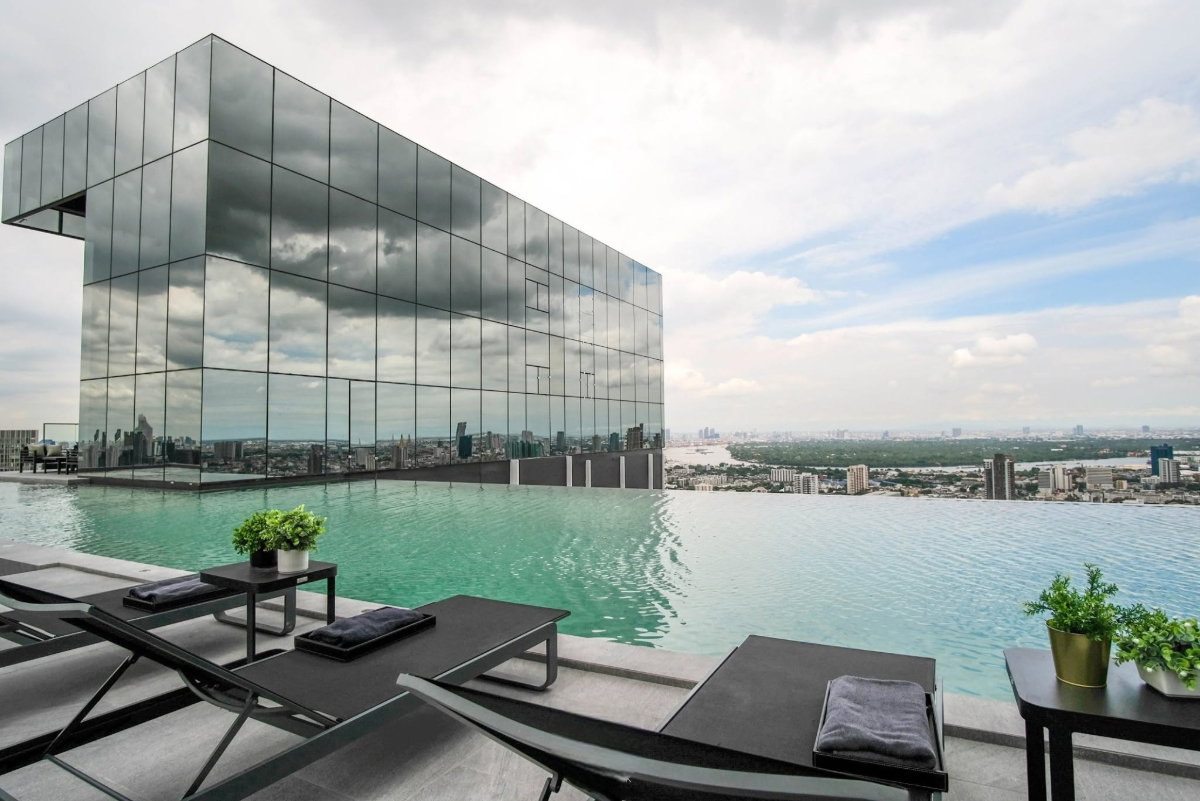 รูป ห้อง Duplex ที่ให้ความรู้สึกเหมือน "บ้าน" กลางสาทร - รูปที่ 1/11