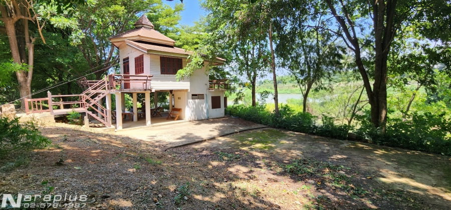 รูป 69060428 : ขายบ้านสไตล์รีสอร์ท พร้อมที่ดินติดโค้งน้ำแม่กลอง เนื้อที่ 2 ไร่ 52.7 ตารางวา พร้อมที่งอกติดแม่น้ำเกือบ 1 ไร่ อ.ท่ามะกา กาญจนบุรี - รูปที่ 1/22