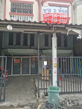 Two adjacent commercial buildings next to the main road, near AC Market Saimai and Saimai Soi 15.