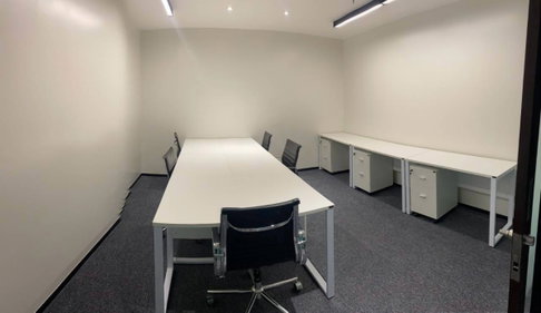 Offices and coworking spaces at KPN Tower in Bangkok's Rama IX commercial district, a prime location near Phra Ram 9 MRT station.