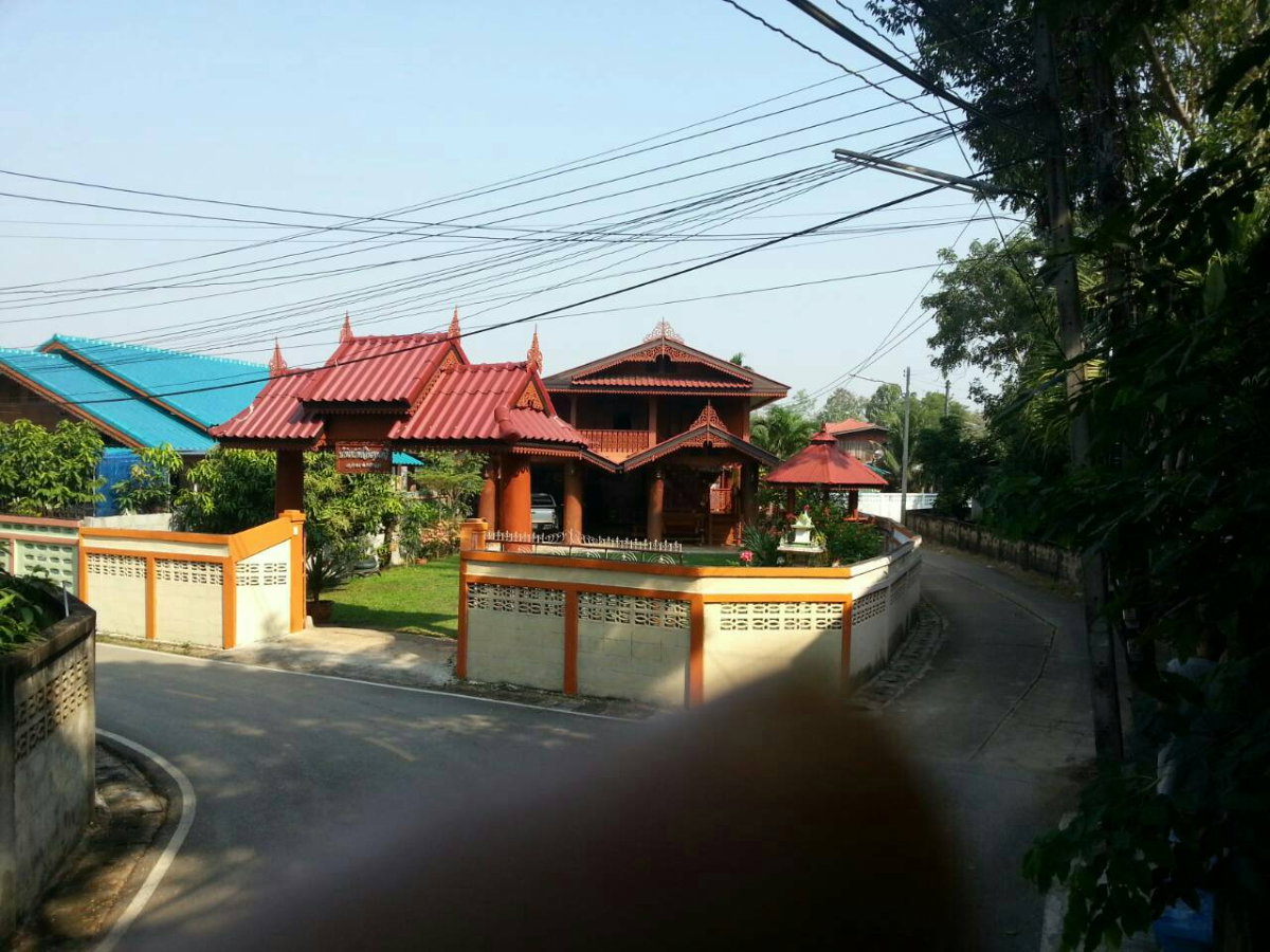 picture Elevated Teak Wood House with Land - 1/5