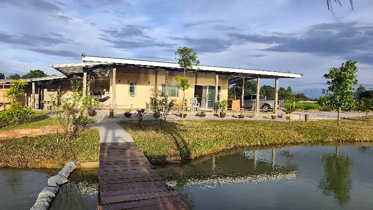 รูป ขายบ้านสวนสวยพร้อมที่ดิน3ไร่1งาน54ตาราวามีบ่อน้ำ สองบ่อเลี้ยงปลาทำสวนที่ดินติดถนนสาธารณะใกล้เทศบาลตำบลสามัคคีพร้อมทำสวนไว้ยามเกษียณมีระบบน้ำเรียบร้อย - รูปที่ 3/33