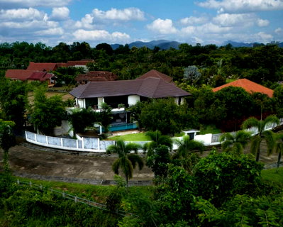 Houses for sale Doi Saket Chiang Mai  : Pool Villa at Doisaket For Sale  The property offers beautiful open views of nature and the mountains, with water nearby.