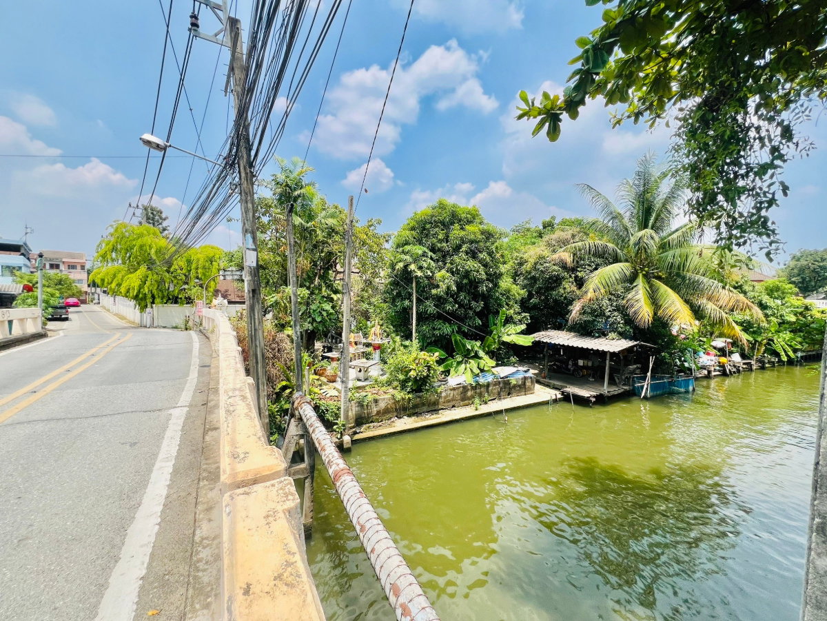 picture Land for sale by a clear water canal - 5/9
